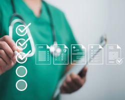 Doctor using a tablet with a digital checklist for medical document verification to interpret blood test results.