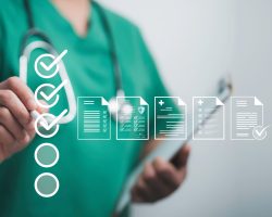 Doctor using a tablet with a digital checklist for medical document verification to interpret blood test results.